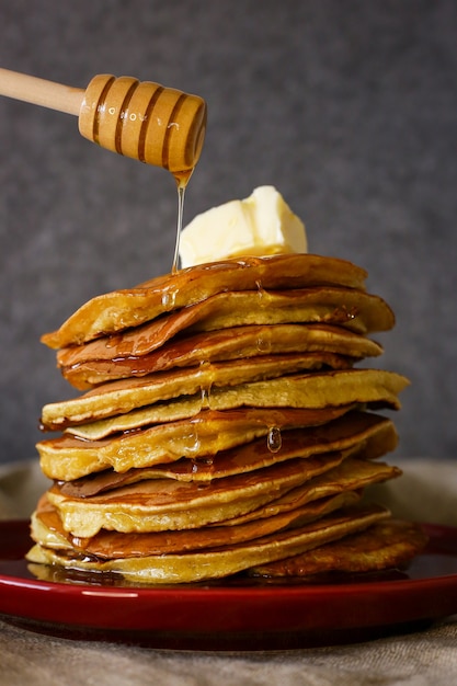 homemade pancakes with butter and honey