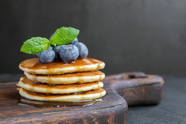 Homemade pancakes with caramel syrup.