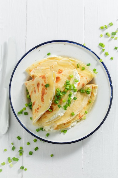 Homemade pancakes with cottage cheese and chive