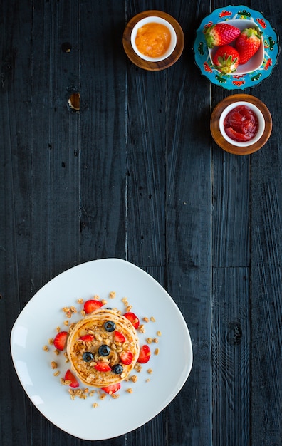 Homemade pancakes with fresh berries, strawberries, blueberries