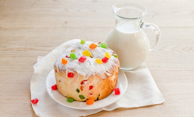 Homemade panettone with jug of milk