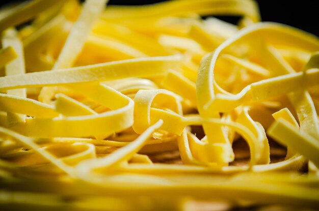 Homemade pasta tagliatelle macro shot