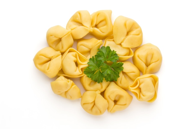 Homemade pasta tortellini with herbs