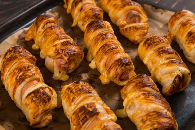 Homemade pastries, sausages in the dough with their own hands