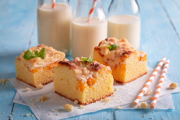 Homemade peach cake as summer snack Best tastes with milk