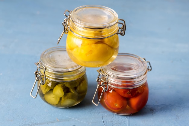 Homemade Pickles Canned Food Cucumbers Cherry Tomatoes and Small Yellow Squash