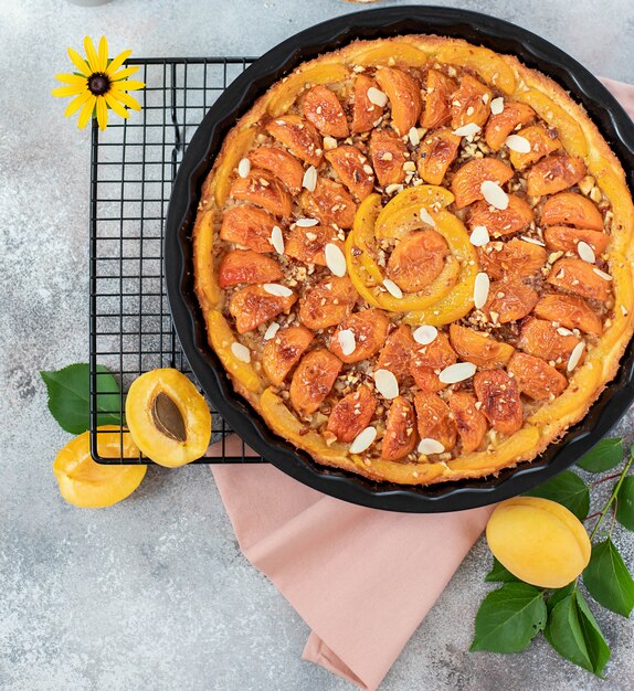 Homemade pie with apricots and nuts