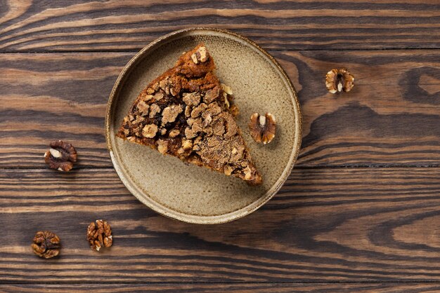 Homemade pie with nuts on a wooden table Healthy food sugar gluten and lactose free vegan