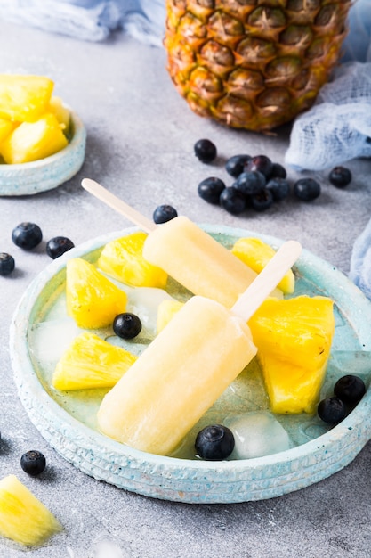 Homemade pineapple popsicles