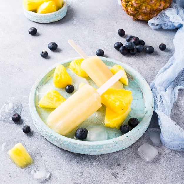 Homemade pineapple popsicles