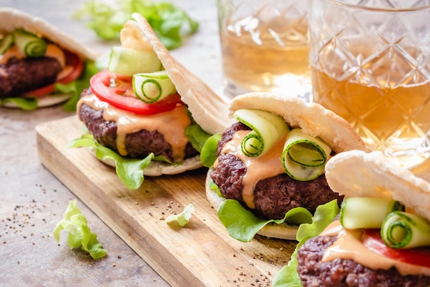 Homemade pita burgers with fresh vegetables