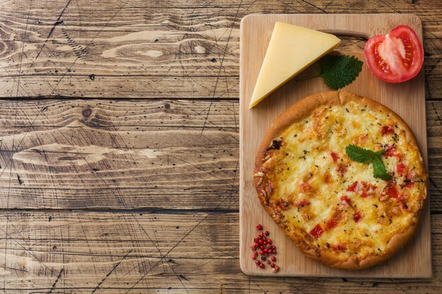 Homemade pizza tortilla with tomato and cheese  