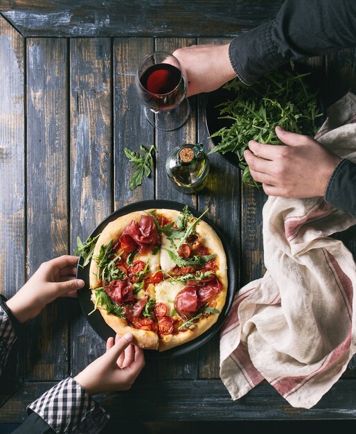 Homemade pizza with bresaola