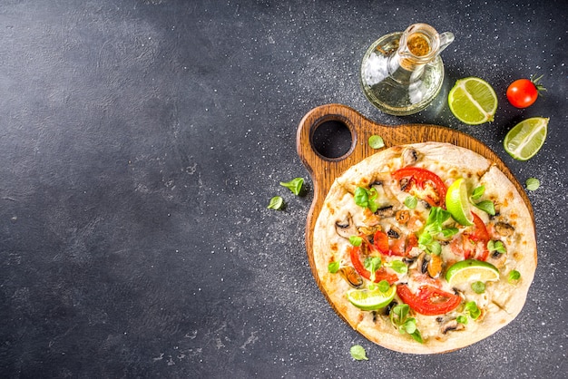 Homemade pizza with seafood