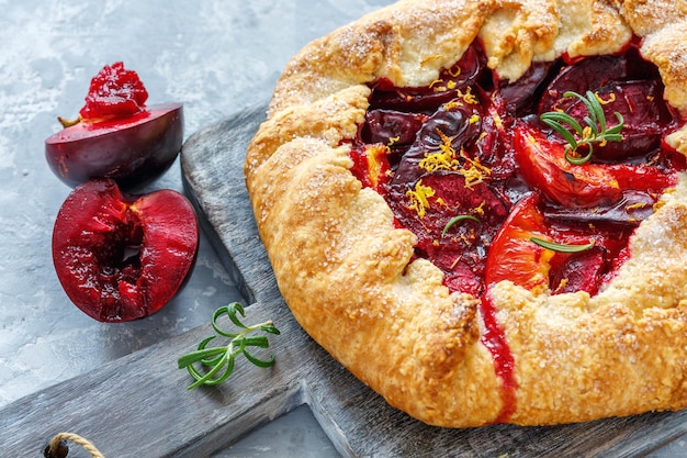 Homemade plum cake with rosemary