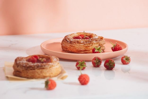 Homemade puff pastry with raspberries Sweet tasty dessert decorated with powdered sugar