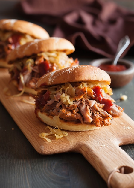 Homemade pulled pork burger with caramelized onion and bbq sauce