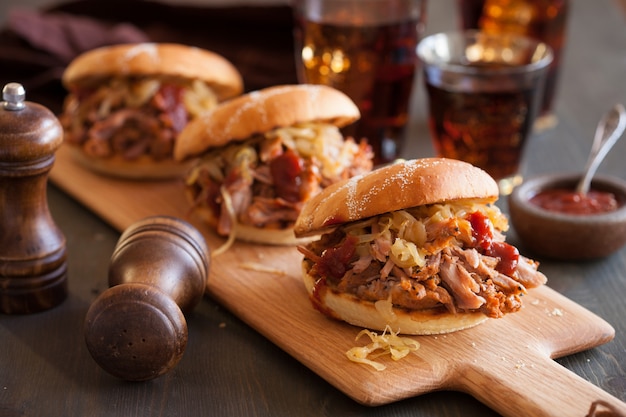 Homemade pulled pork burger with caramelized onion and bbq sauce