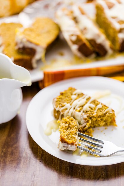 Homemade pumpkin bread with orange glazing on top