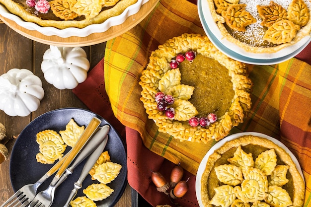 Homemade pumpkin pies with Autumn stamped leafs.