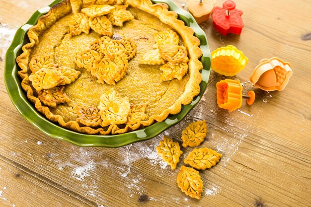 Homemade pumpkin pies with Autumn stamped leafs.