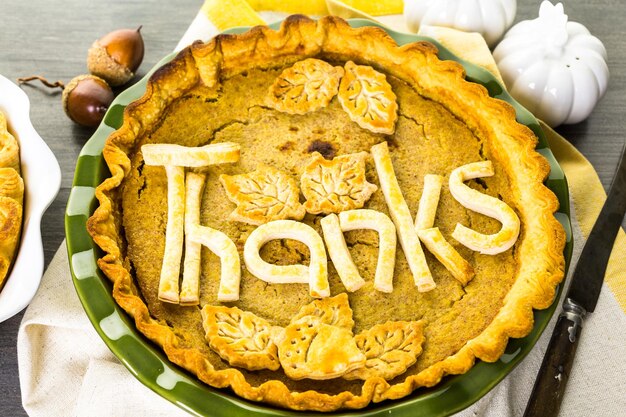 Homemade pumpkin pies with Autumn stamped leafs.