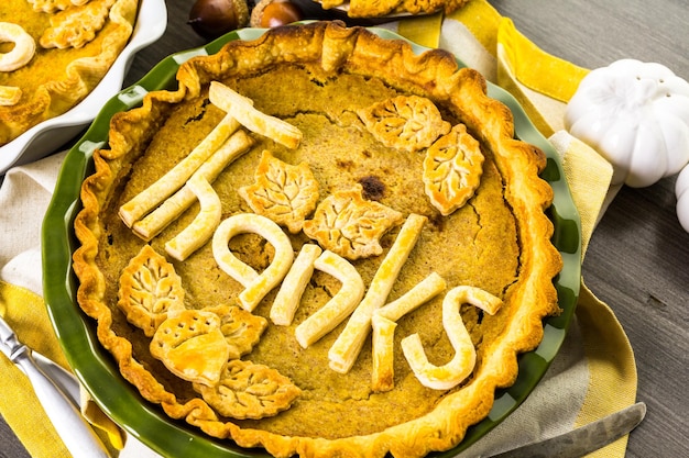 Homemade pumpkin pies with Autumn stamped leafs.