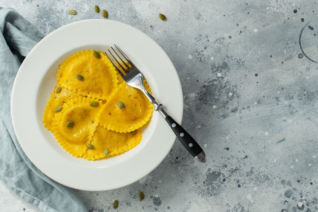 Homemade Pumpkin Ravioli with butter.