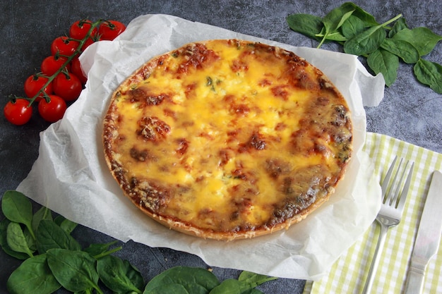 Homemade quiche lorraine with salmon, shrimps and cheese