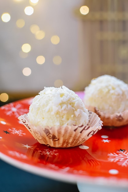 homemade raffaello and new year's mood on a plate