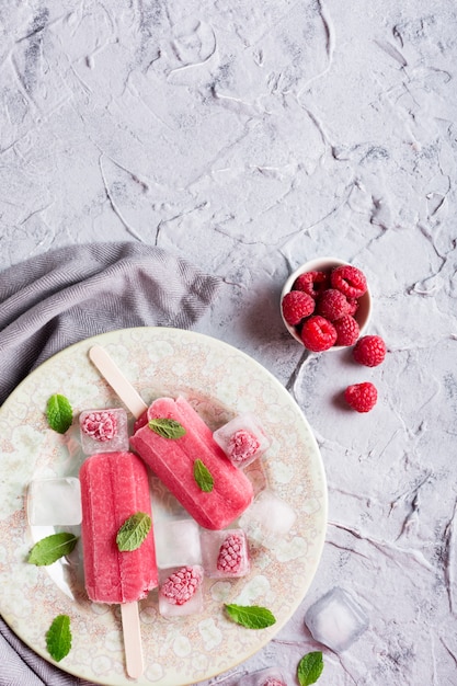 Homemade raspberry popsicles