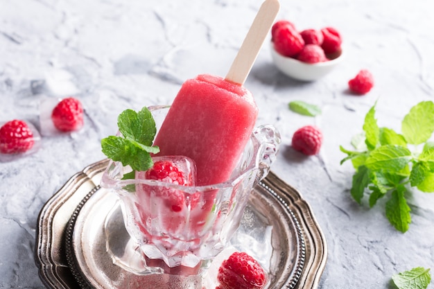 Homemade raspberry popsicles