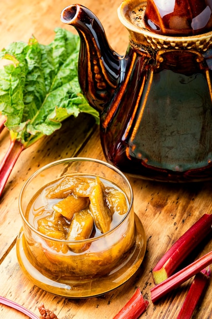 Homemade rhubarb jam in glass jar.Sweet food