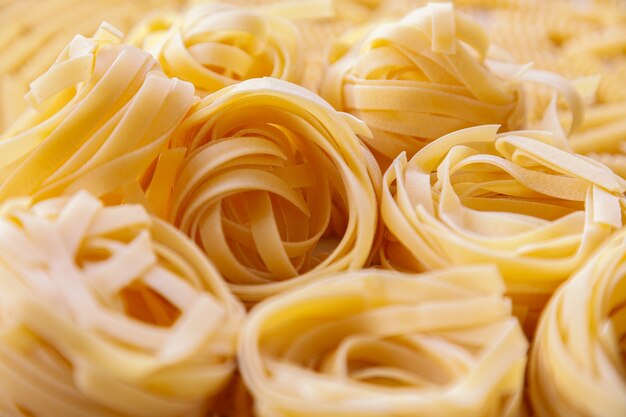 Homemade rolled raw fettuccine pasta