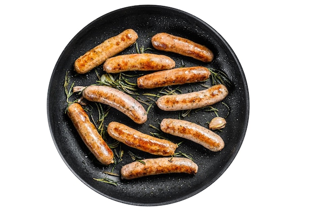 Photo homemade sausages fried in a pan beef and pork meat isolated on white background