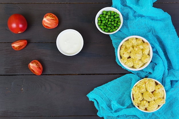 Homemade shepherd's pie on wooden background