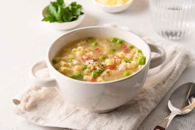 Homemade soup with ditalini pasta and vegetables.