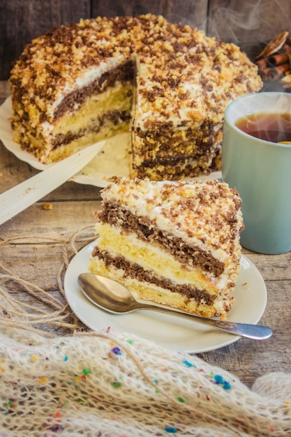 Homemade sour cream cake with tea. selective focus.