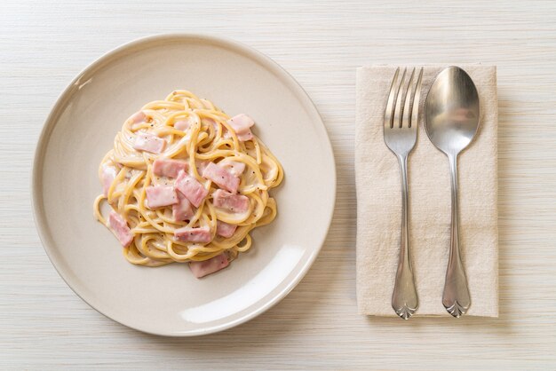 homemade spaghetti white cream sauce with ham - Italian food style