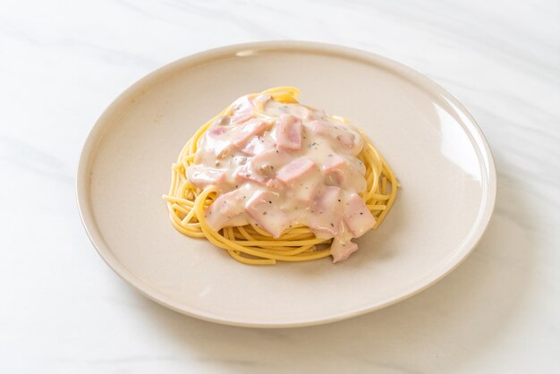 homemade spaghetti white cream sauce with ham - Italian food style