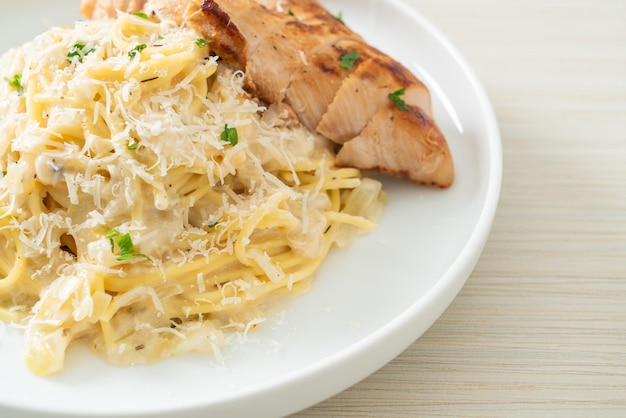 homemade spaghetti white creamy sauce with grilled chicken