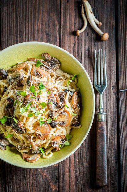 Homemade spaghetti with mushrooms mushrooms and parsley