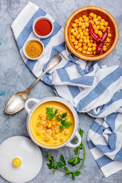 Homemade spicy pumpkin soup with chickpeas