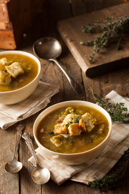 Homemade Split Pea Soup with Croutons and Sour Cream