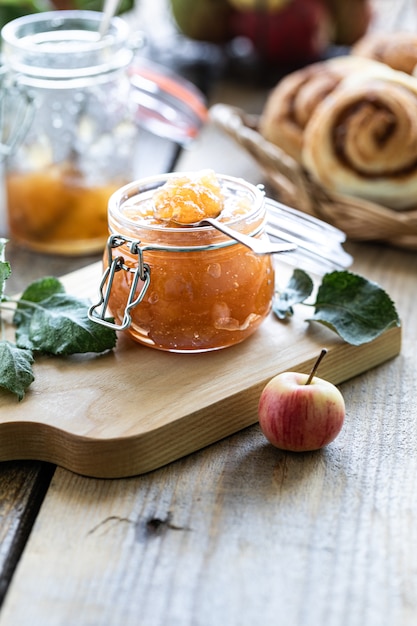 Homemade Sweet Apple Jam - Organic Healthy Vegetarian Food. Apple jam Apple marmalade. Buns with jam and cinnamon. With copy space.