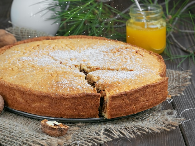 Homemade swiss closed walnut pie with almonds and walnuts