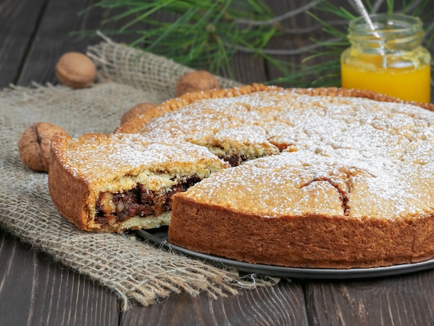 Homemade swiss closed walnut pie with almonds and walnuts