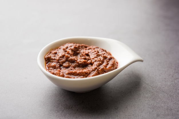 Homemade Tandoori Paste or Marinade mixture, in a bowl. used for grilled chicken or Paneer or vegetable.