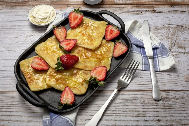 Homemade and traditional Arabic rghaif or msemen with honey and cream cheese. Moroccan Food