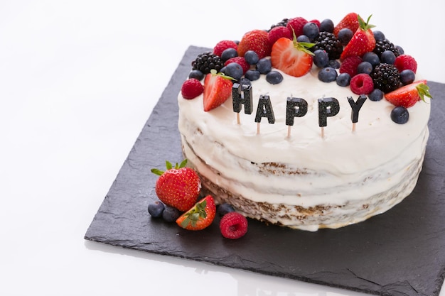 Premium Photo | Homemade vanilla birthday cake decorated with ...